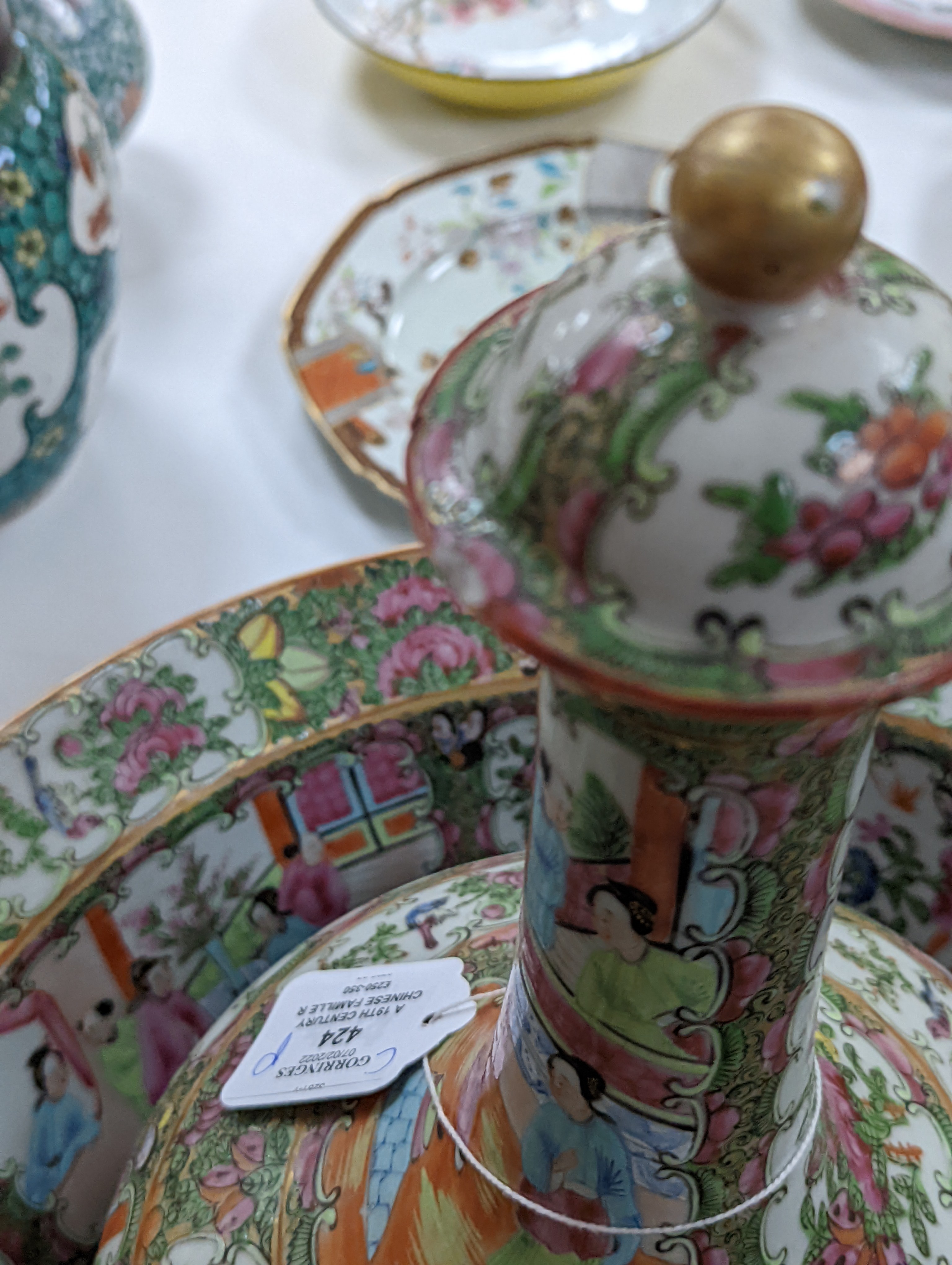 A 19th century Chinese famille rose water bottle with cover and basin, water bottle and cover 39 cms high.